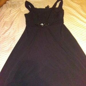 Black dress with design on the top center